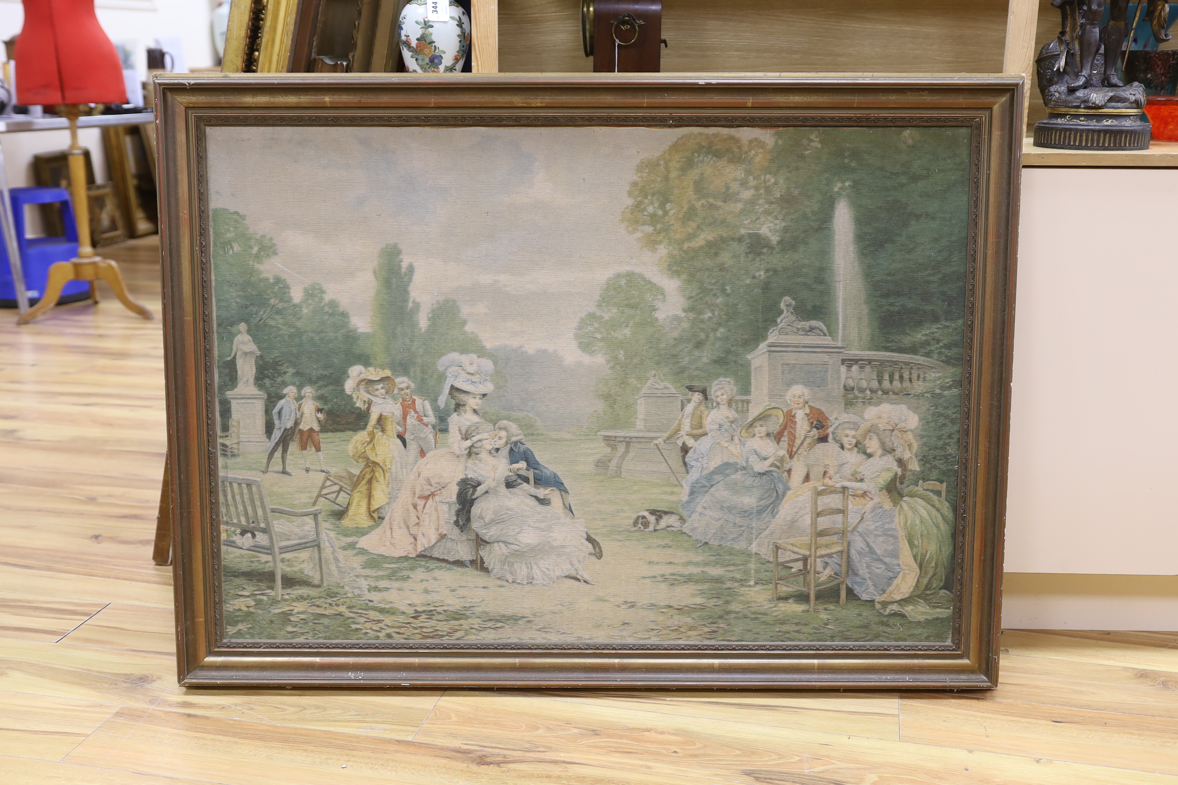 A printed machined tapestry panel depicting ladies and gallants in parkland, 79 x 114cm